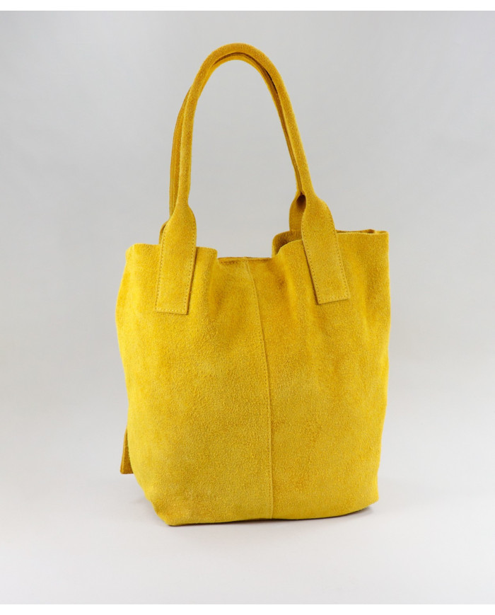 Bolso de la señora amarilla en la piel