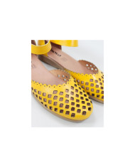 Yellow sandals of Madame Ginova Perforated