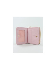 La pequeña pared rosa de la señora