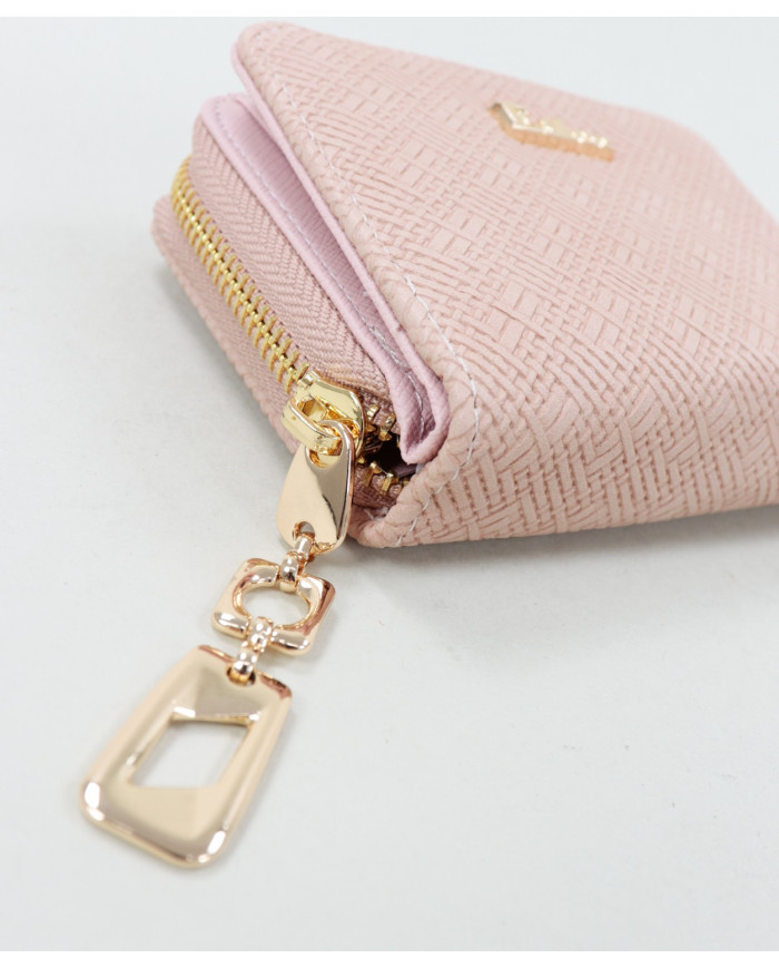 La pequeña pared rosa de la señora