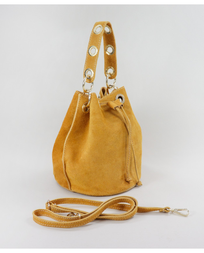 Mala Bucket Round Mustard en la piel