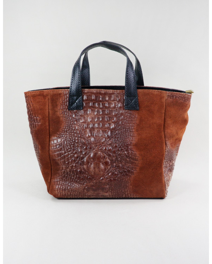 Camel de la señora de la mano en la piel