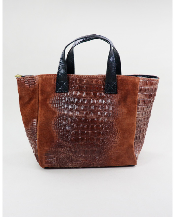 Camel de la señora de la mano en la piel