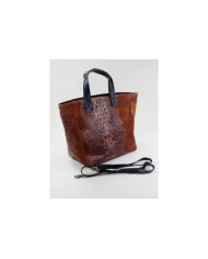 Camel de la señora de la mano en la piel