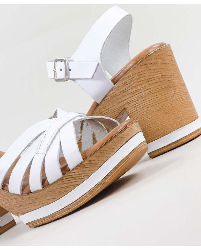 Ms. Ginova Compensated Sandals