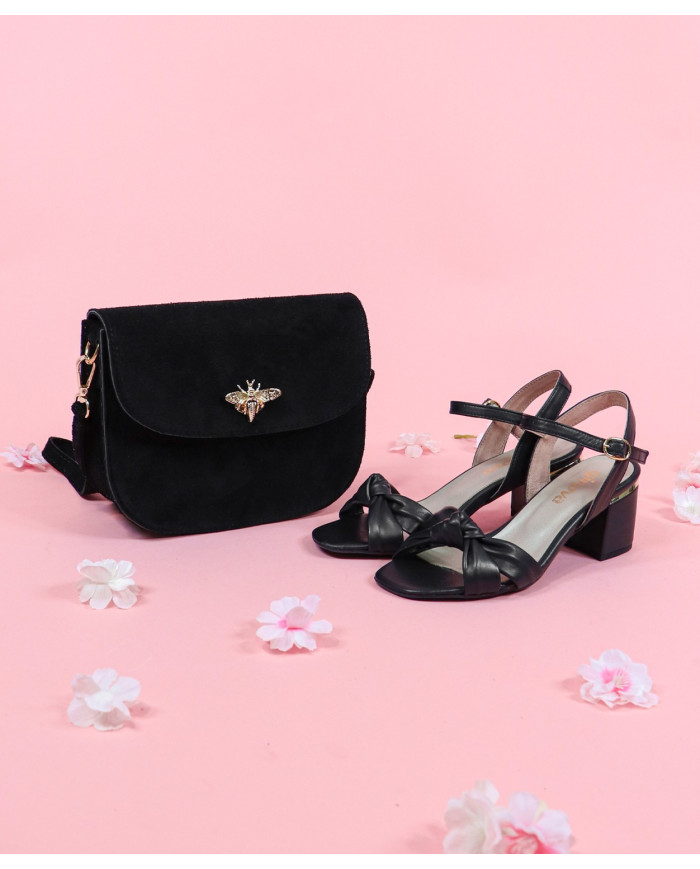 Black Suitcase in Lady's Skin