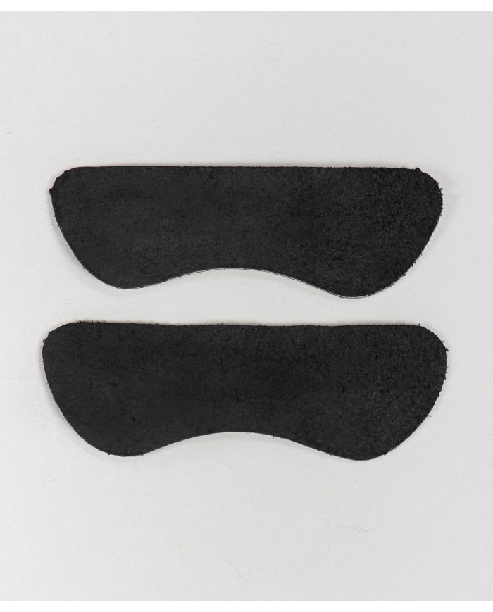 Protector negro de tacón de gel fijo y productos básicos