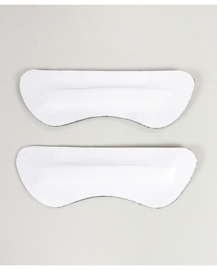 Protector negro de tacón de gel fijo y productos básicos