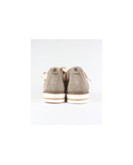 Zapatos perforados de mujeres