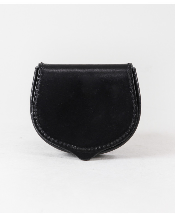 Monedas de hombres de puerta en la piel