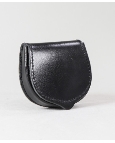 Monedas de hombres de puerta en la piel