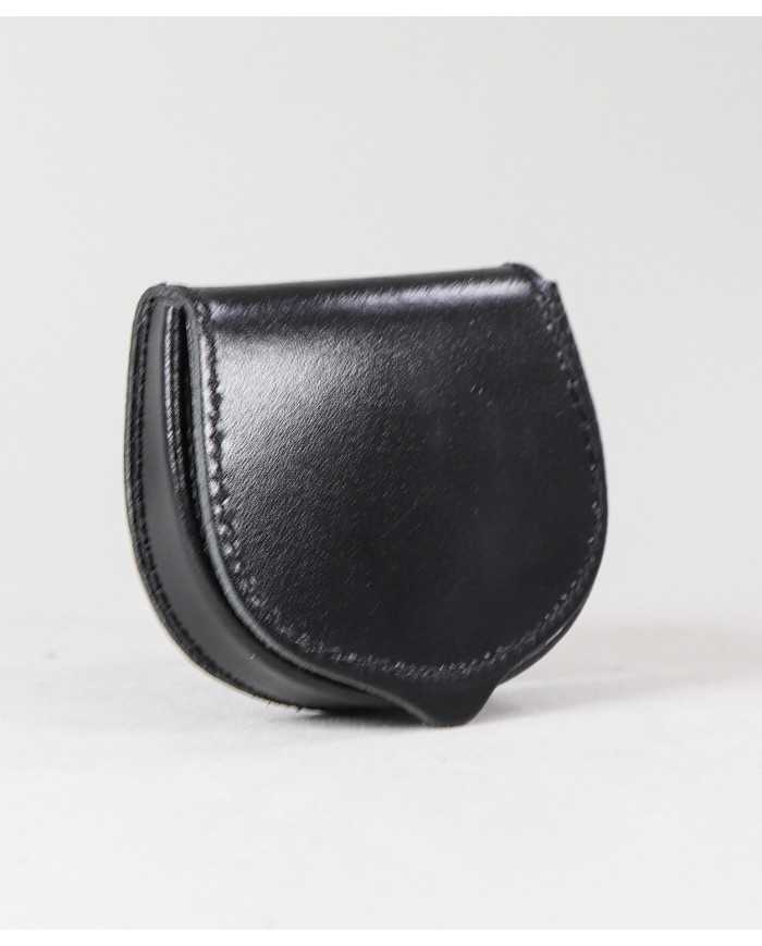 Monedas de hombres de puerta en la piel