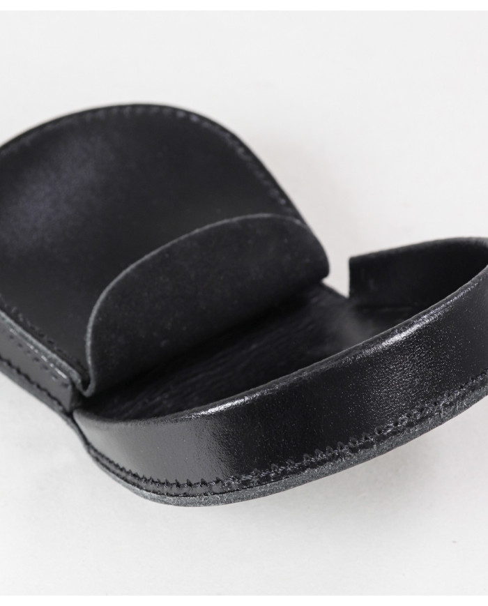 Monedas de hombres de puerta en la piel