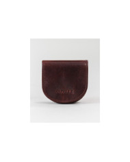 Monedas de hombres de puerta en la piel