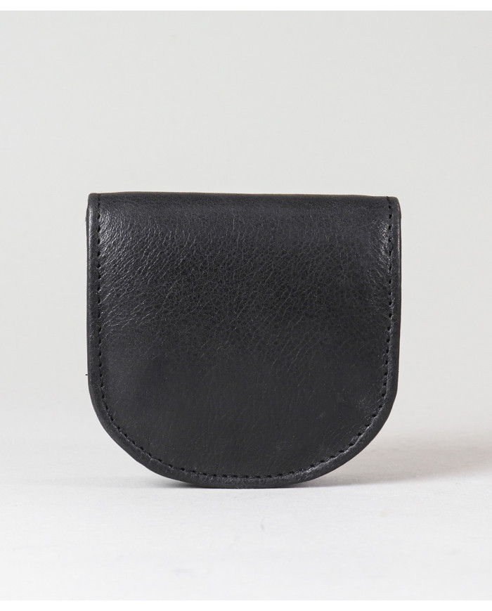 Monedas de hombres de puerta en la piel