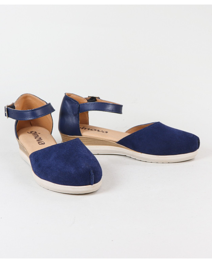 Sandalias de mujeres cerradas y mercantiles