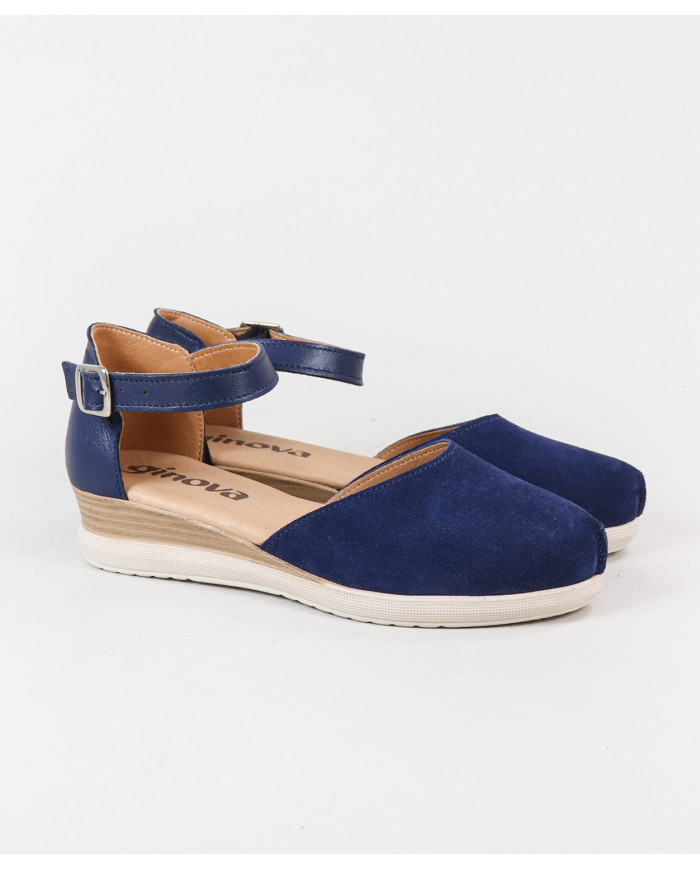 Sandalias de mujeres cerradas y mercantiles