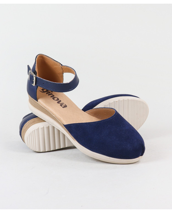 Sandalias de mujeres cerradas y mercantiles