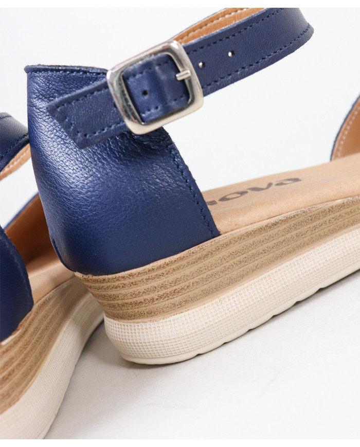 Sandalias de mujeres cerradas y mercantiles