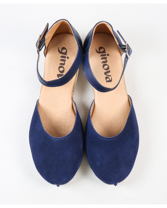 Sandalias de mujeres cerradas y mercantiles