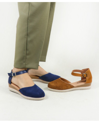 Sandalias de mujeres cerradas y mercantiles