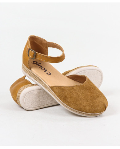 Sandalias de mujeres cerradas y mercantiles