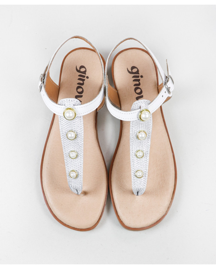Sandalias de mujeres con perlas en la Franja