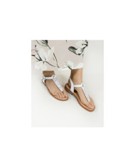 Sandalias de mujeres con perlas en la Franja