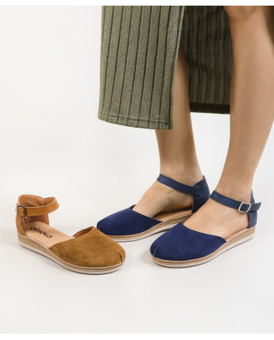 Sandalias de mujeres cerradas y mercantiles