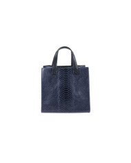 Bolsa de mano azul de las mujeres en la piel
