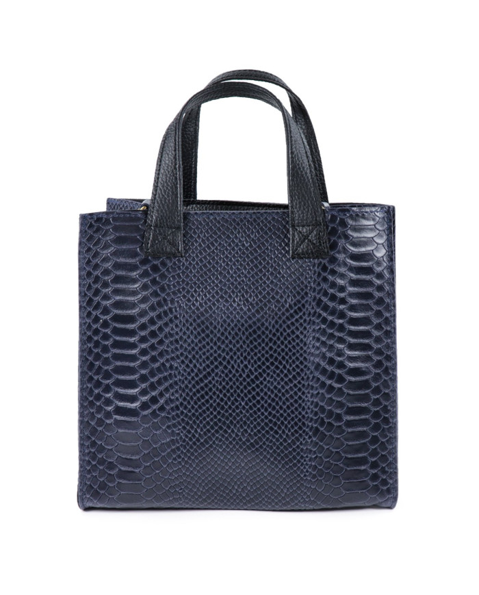 Bolsa de mano azul de las mujeres en la piel