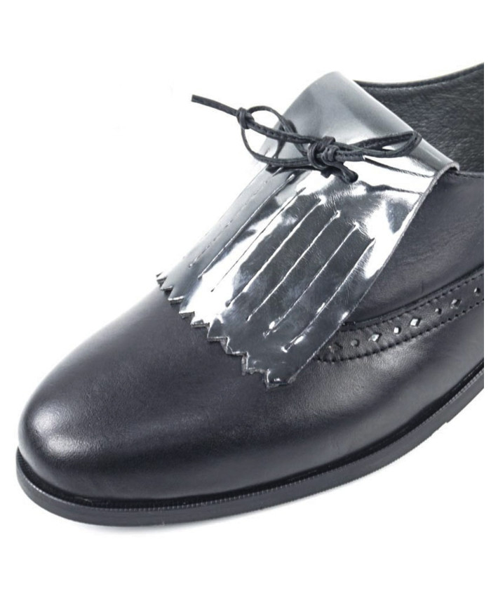 Zapatos con naranjas metálicas