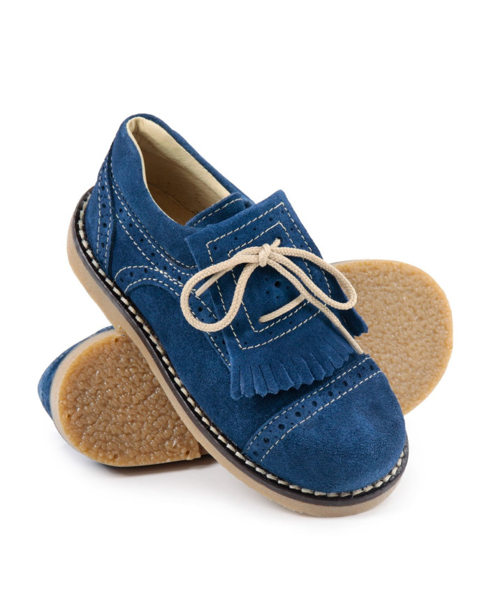 Zapatos para niños con naranjas